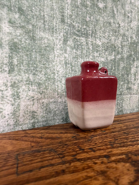 Small Two-Tone Ceramic Jug with Rich Red and Cream Glaze