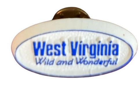 Collection of Vintage Travel Souvenir Pins from Various Locations