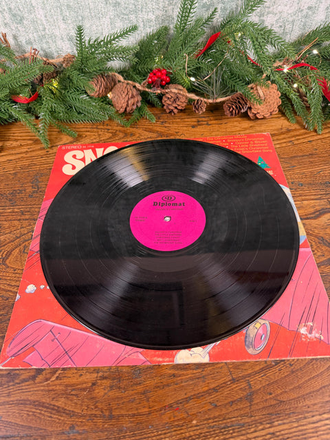 Snoopy's Christmas Vinyl Record by Diplomat - Festive Holiday Music