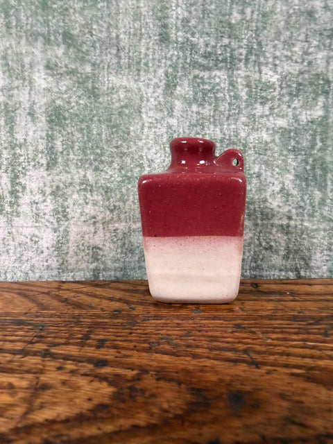 Small Two-Tone Ceramic Jug with Rich Red and Cream Glaze