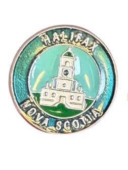 Collection of Vintage Travel Souvenir Pins from Various Locations