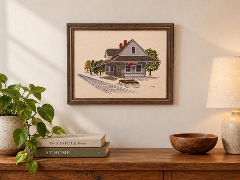 Framed Cross-Stitch Artwork Featuring a Charming Train Station Scene