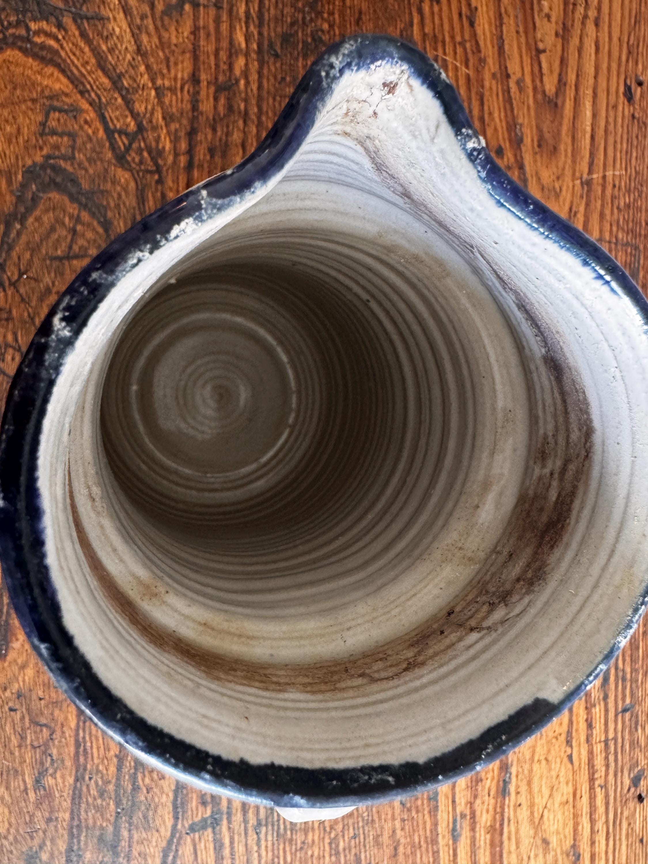 Hand-Painted Ceramic Pitcher with Blue Floral Design