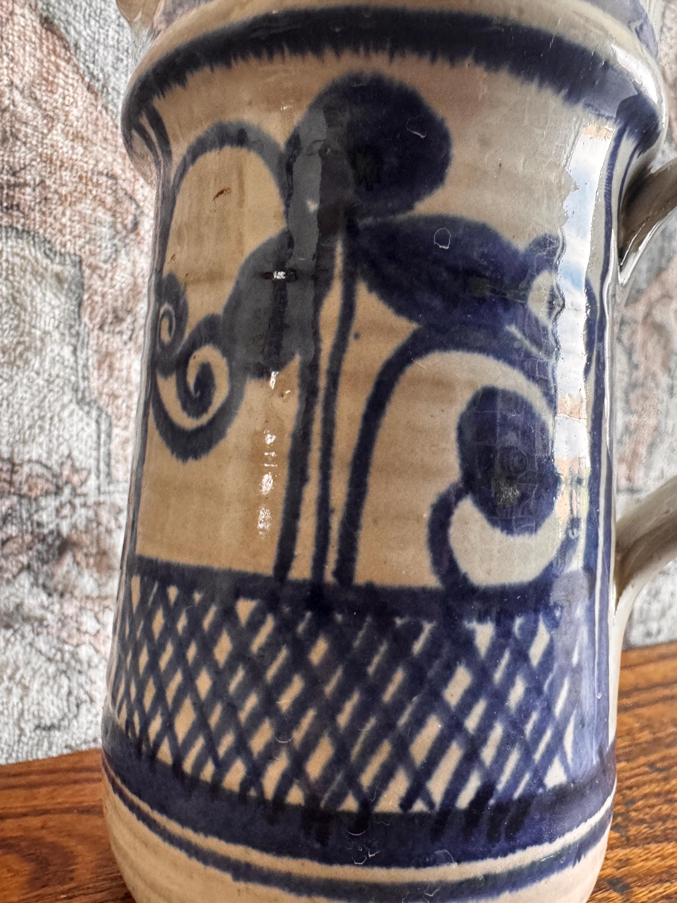 Hand-Painted Ceramic Pitcher with Blue Floral Design