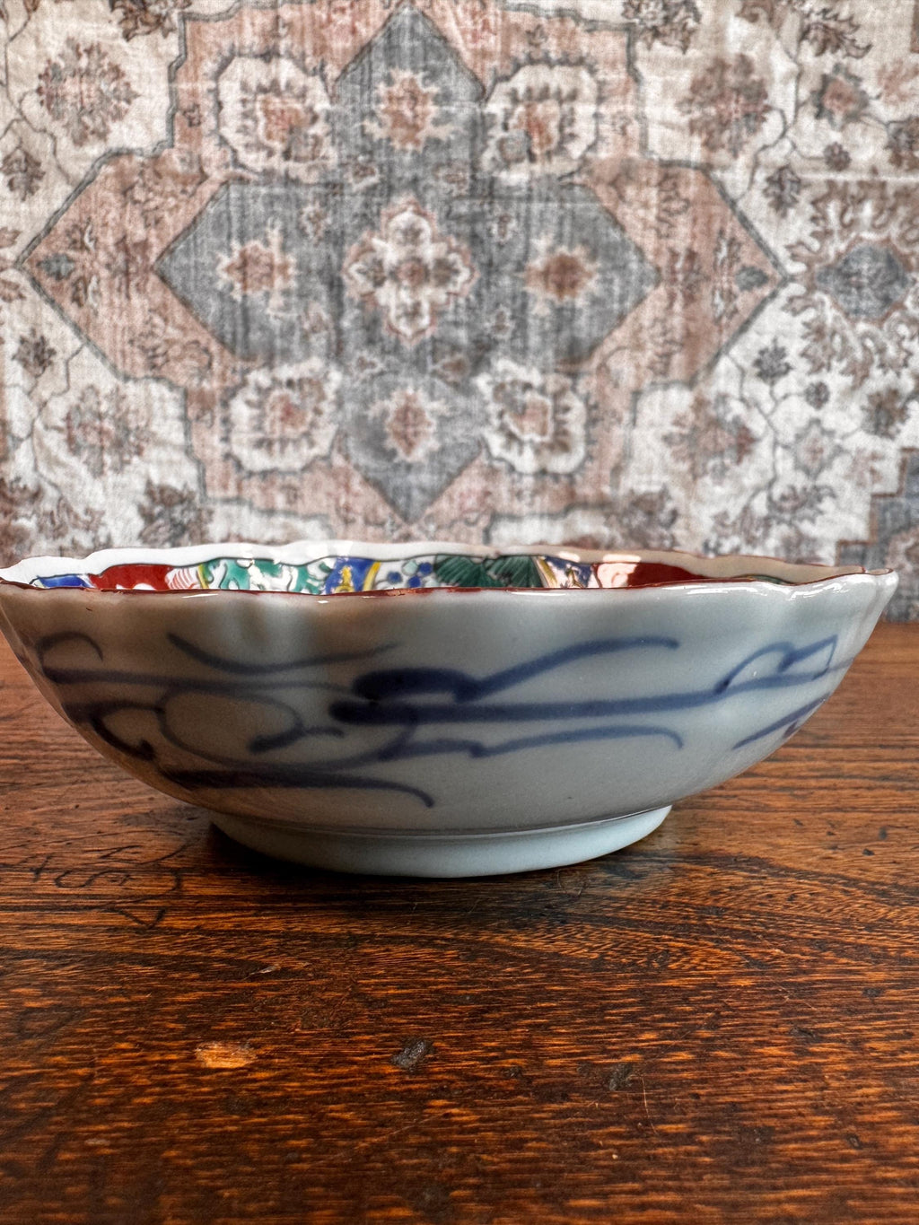Hand-Painted Porcelain Bowl with Bird and Floral Motif