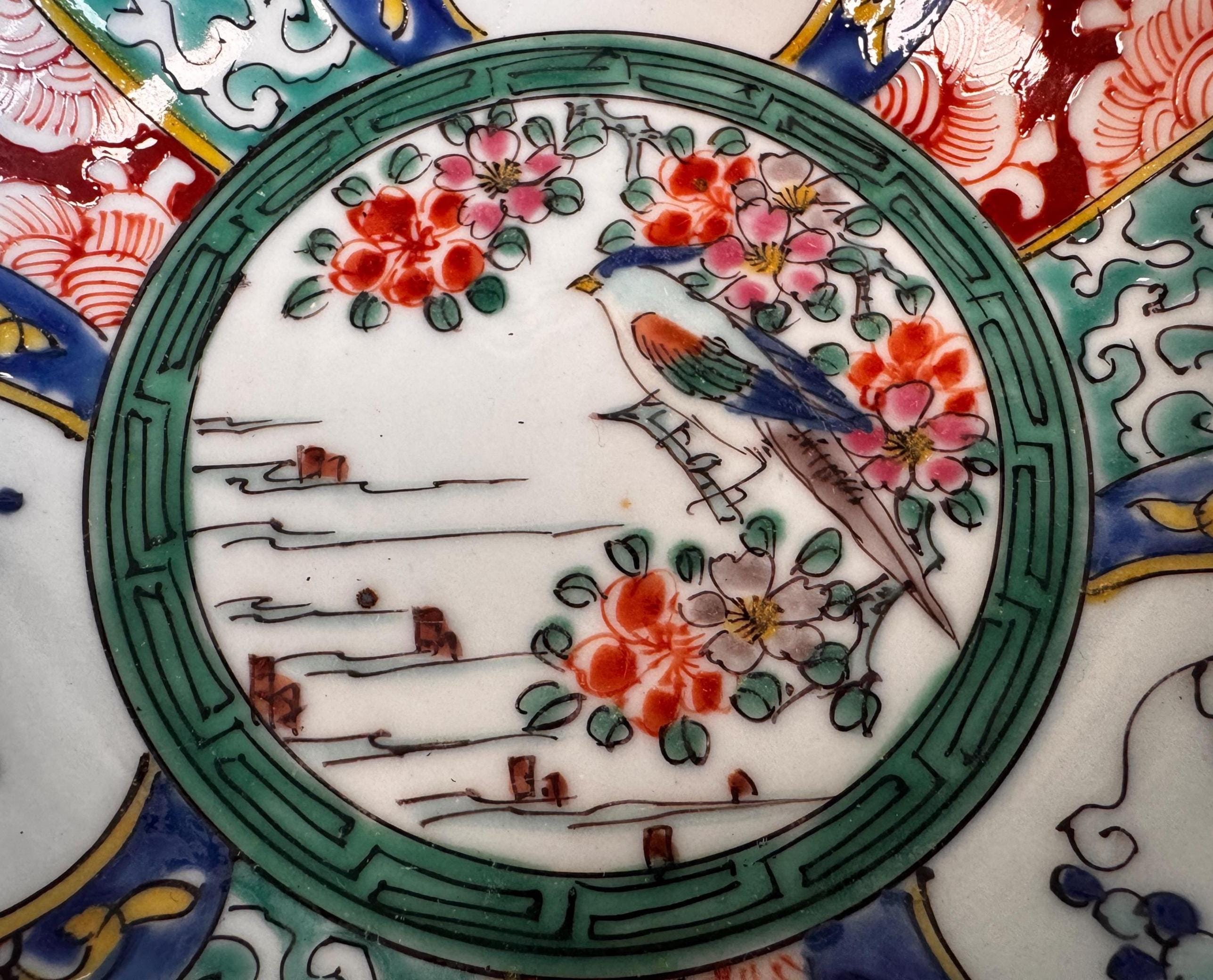 Hand-Painted Porcelain Bowl with Bird and Floral Motif