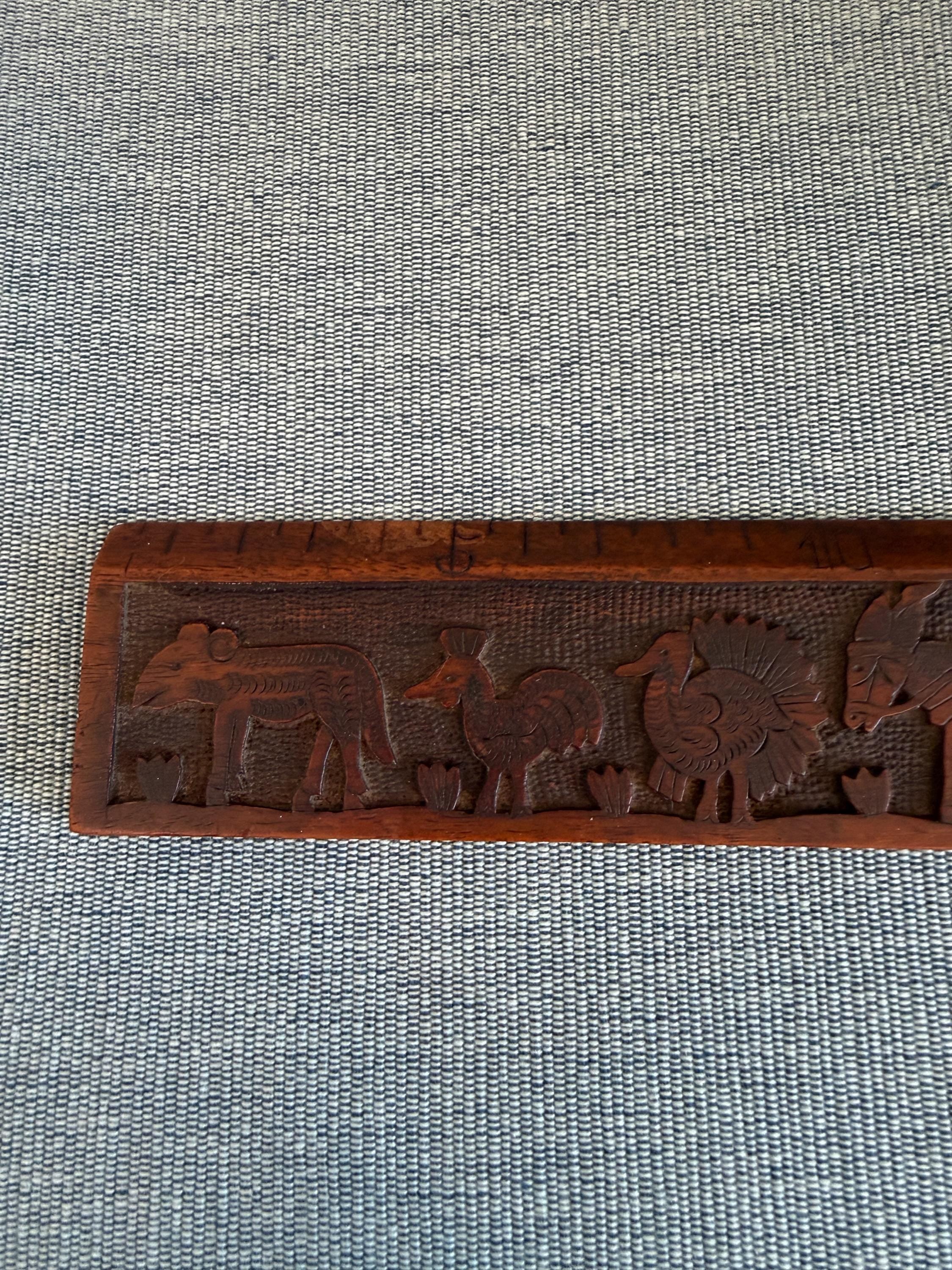 Taormina Carved Wooden Ruler with Animal and Nature Motifs