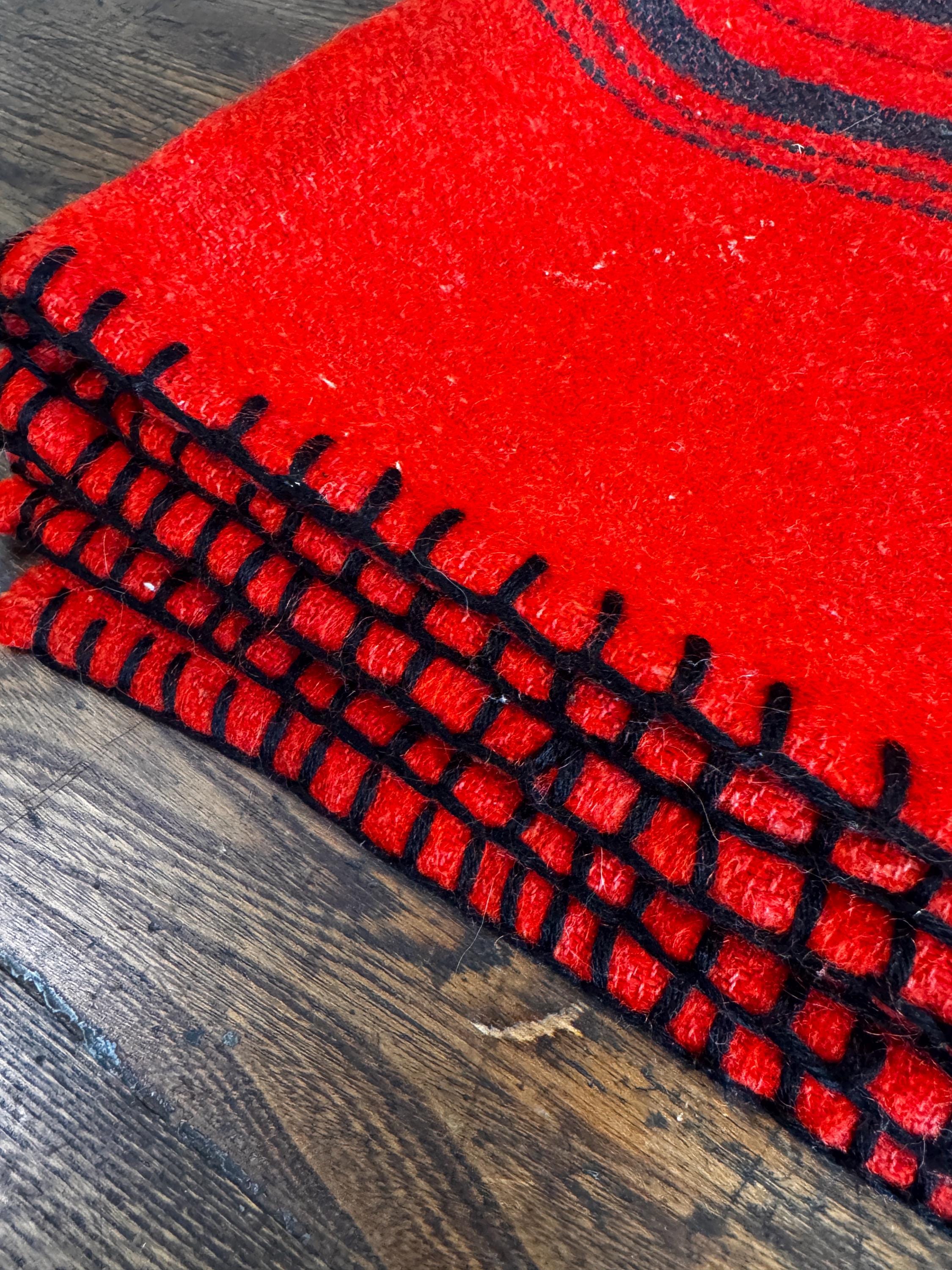 Red Wool Blanket with Black Stripes and Whipstitch Edging