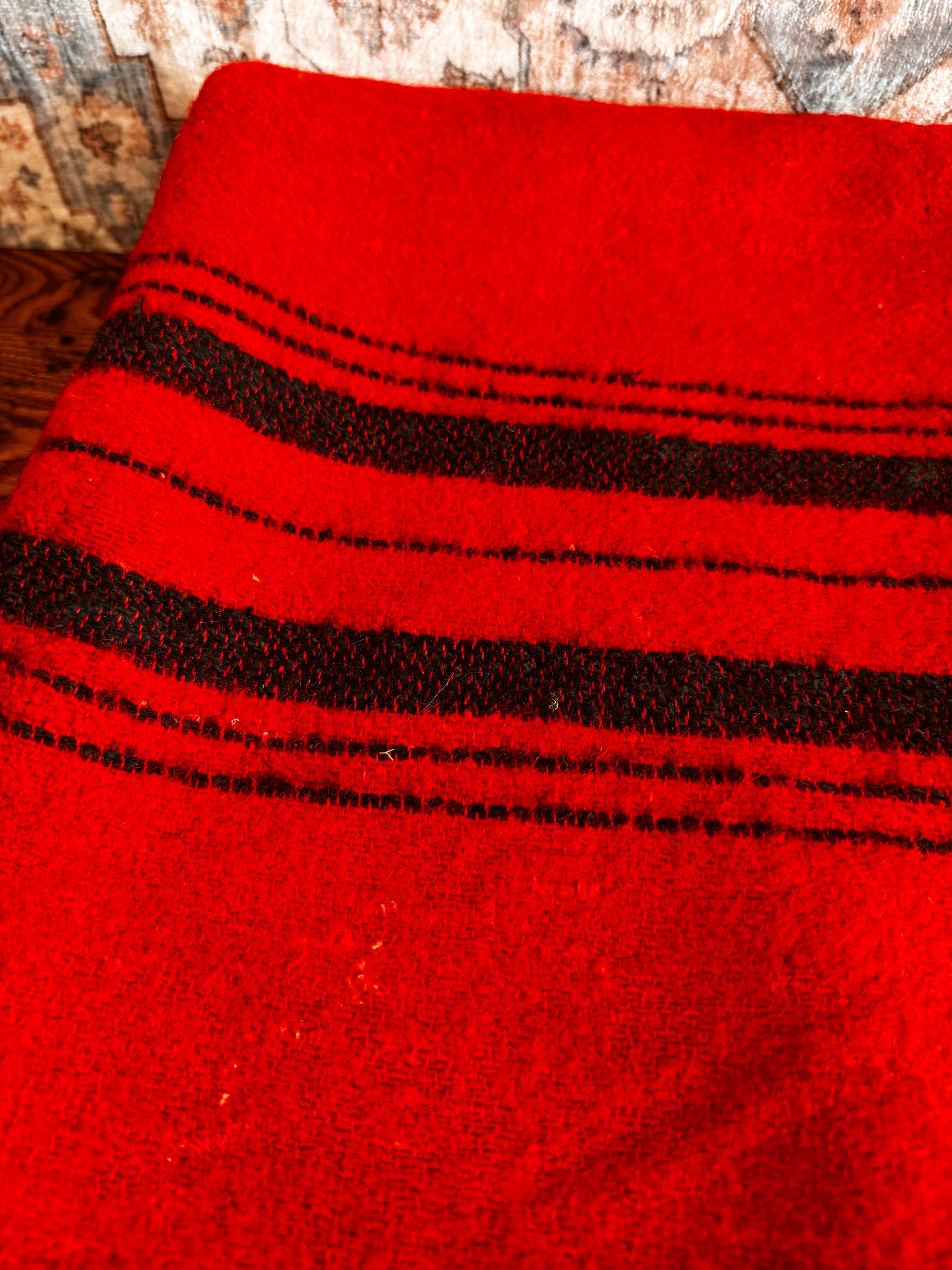 Red Wool Blanket with Black Stripes and Whipstitch Edging