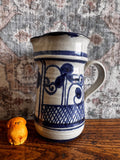 Hand-Painted Ceramic Pitcher with Blue Floral Design