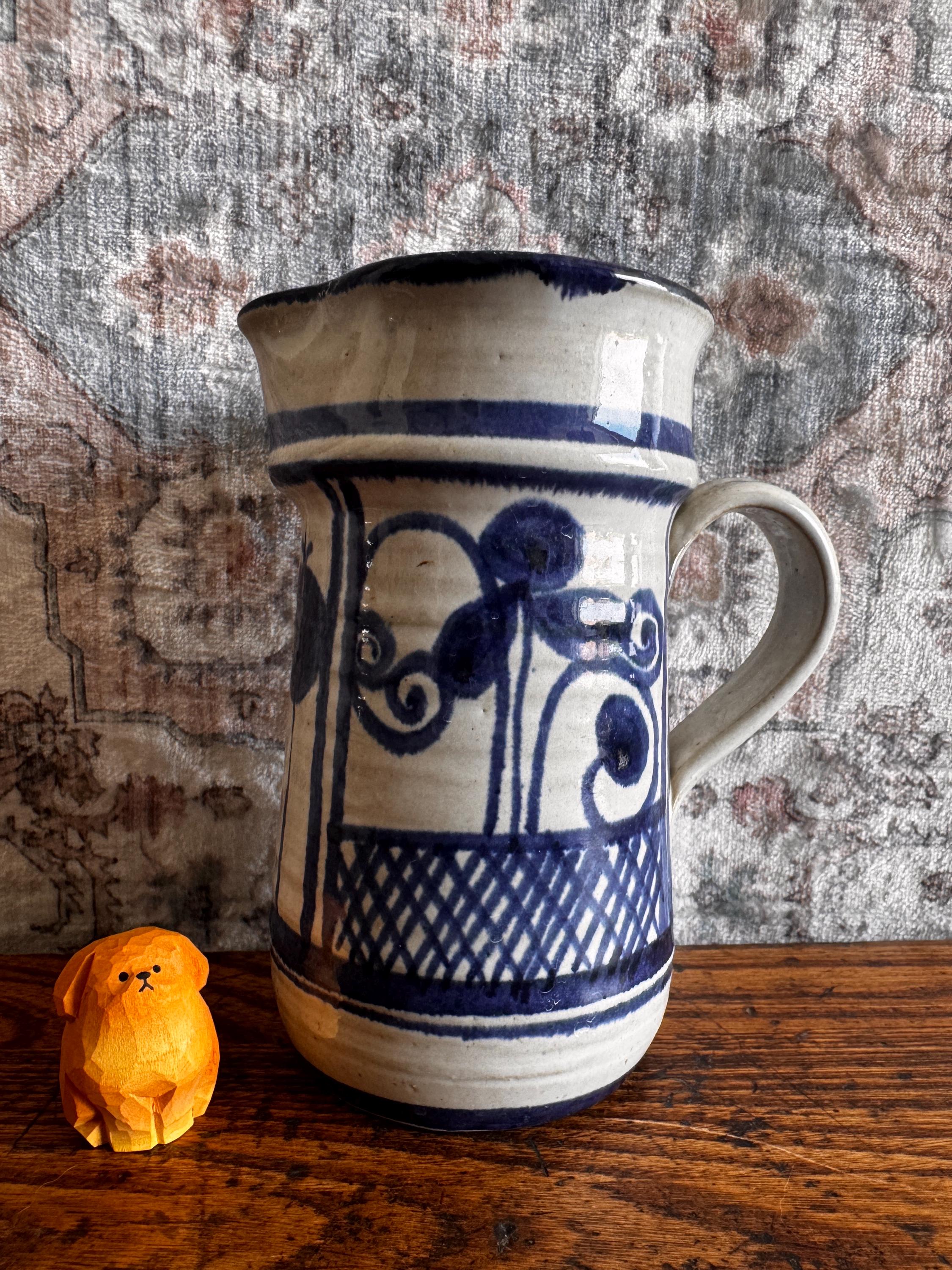 Hand-Painted Ceramic Pitcher with Blue Floral Design