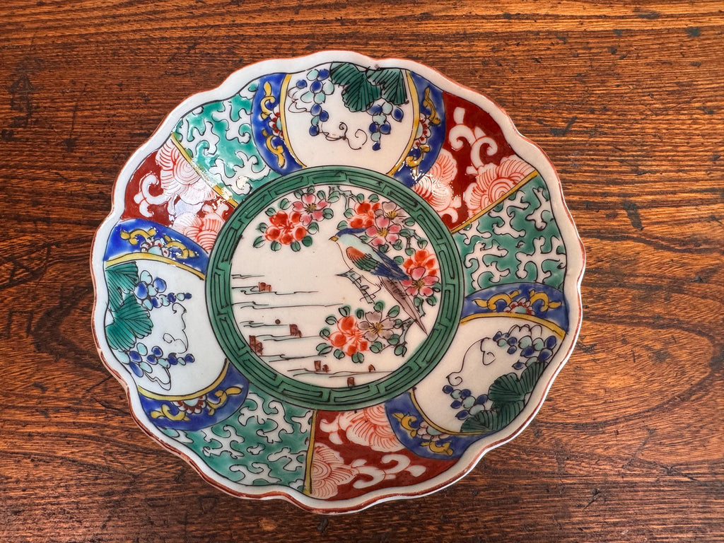 Hand-Painted Porcelain Bowl with Bird and Floral Motif