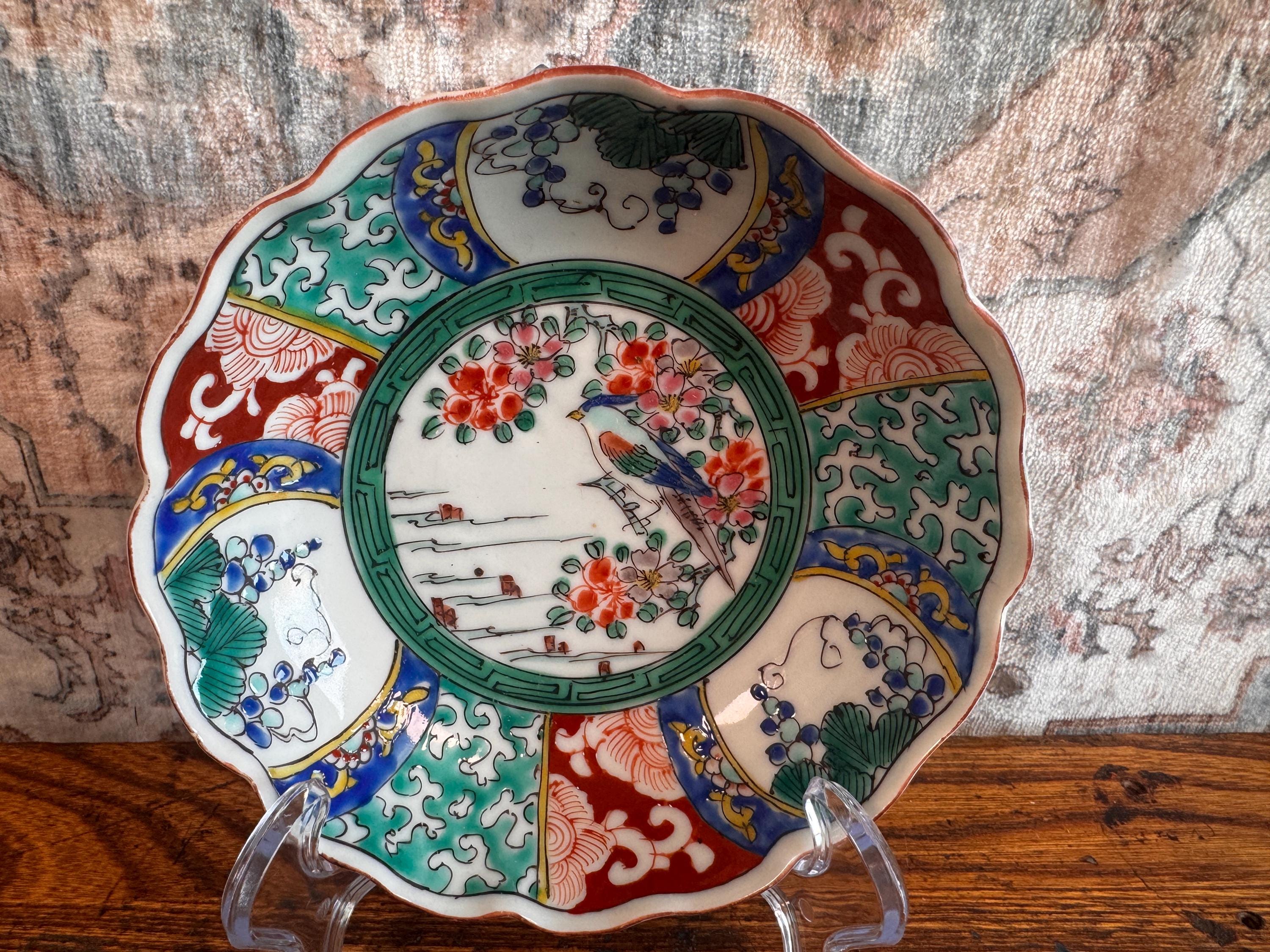 Hand-Painted Porcelain Bowl with Bird and Floral Motif