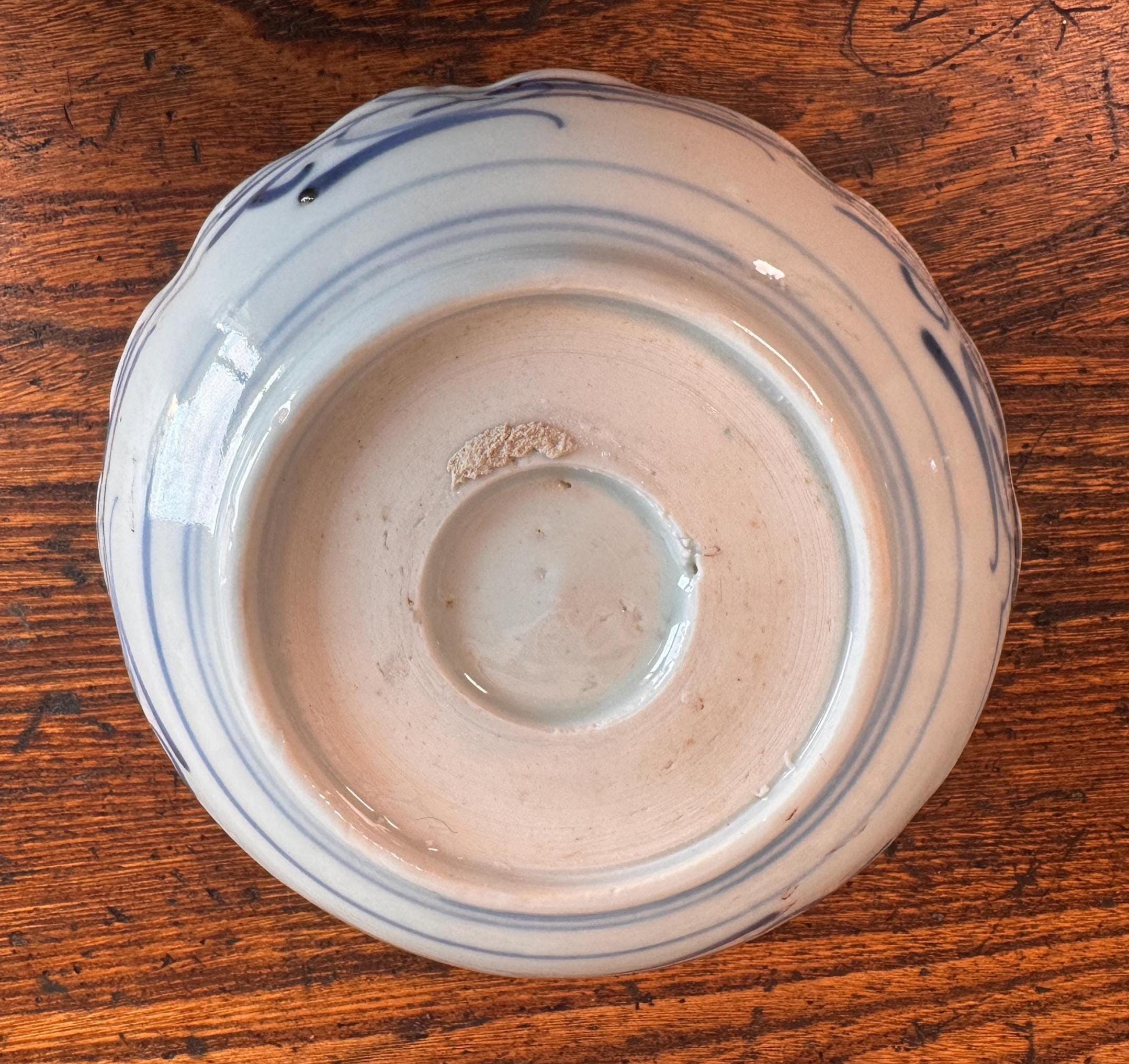 Hand-Painted Porcelain Bowl with Bird and Floral Motif