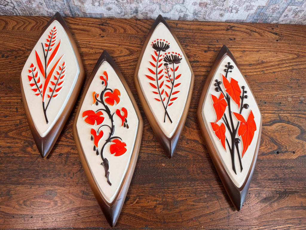 Set of Four Mid-Century Modern Syroco Wall Plaques with Floral Motifs