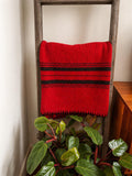 Red Wool Blanket with Black Stripes and Whipstitch Edging