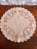 Hand-Embroidered Round Linen Doily with Floral Motifs