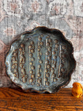Handmade Ceramic Decorative Plate with Blue Glaze and Textured Pattern