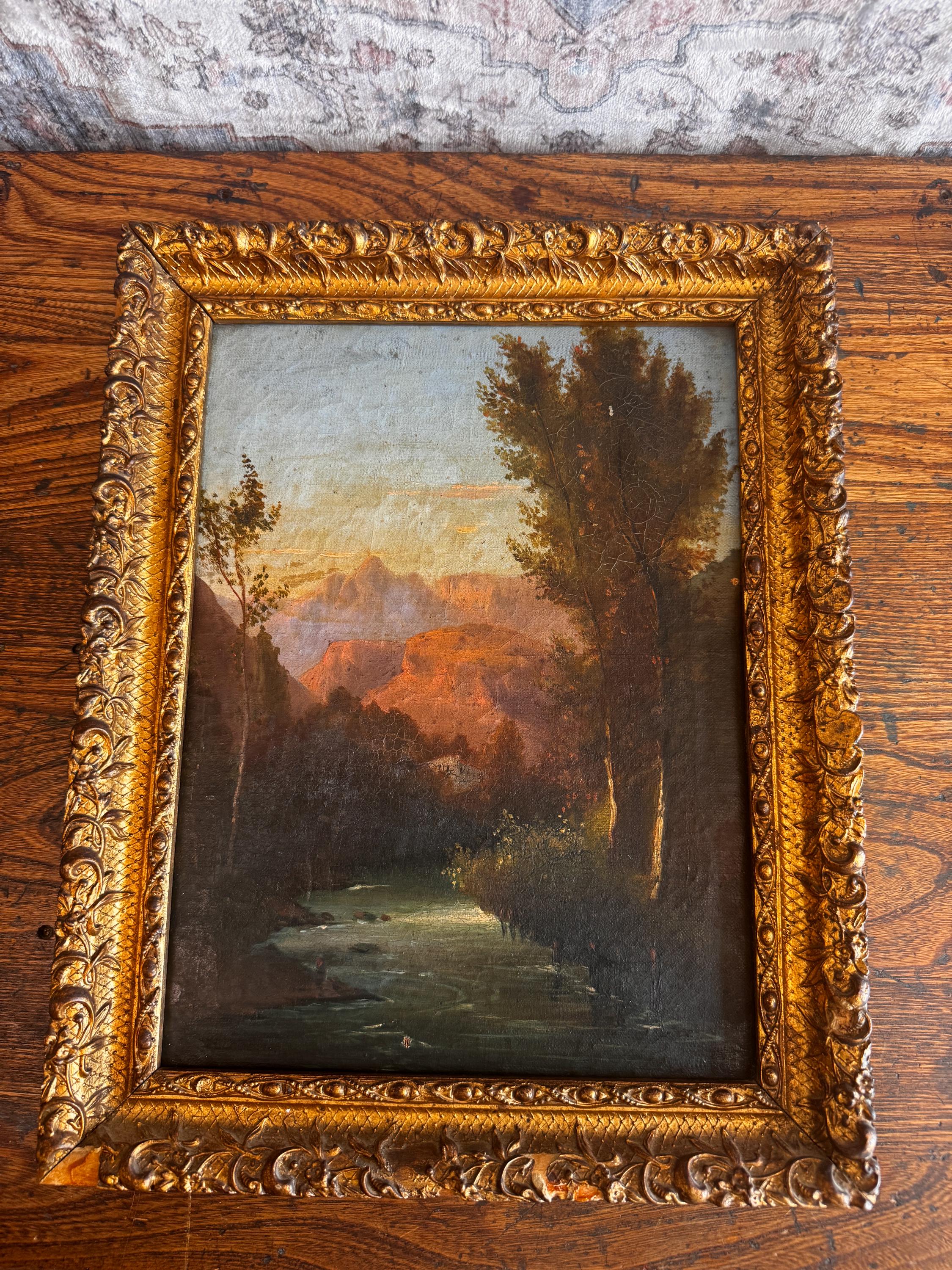 Framed Landscape Painting of a River and Trees at Sunset