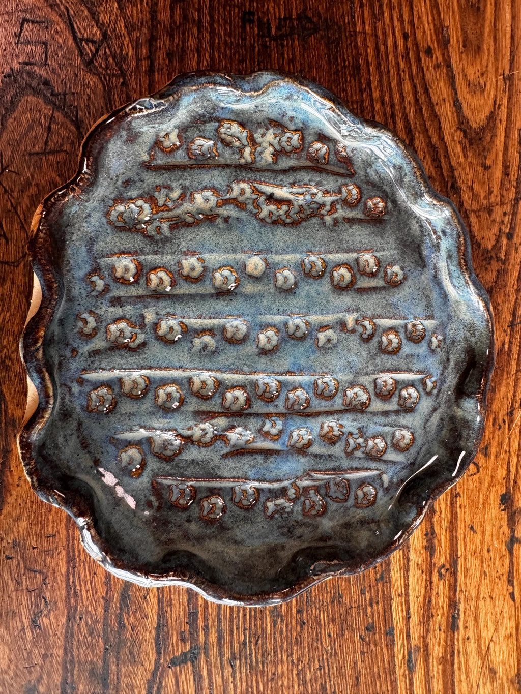 Handmade Ceramic Decorative Plate with Blue Glaze and Textured Pattern