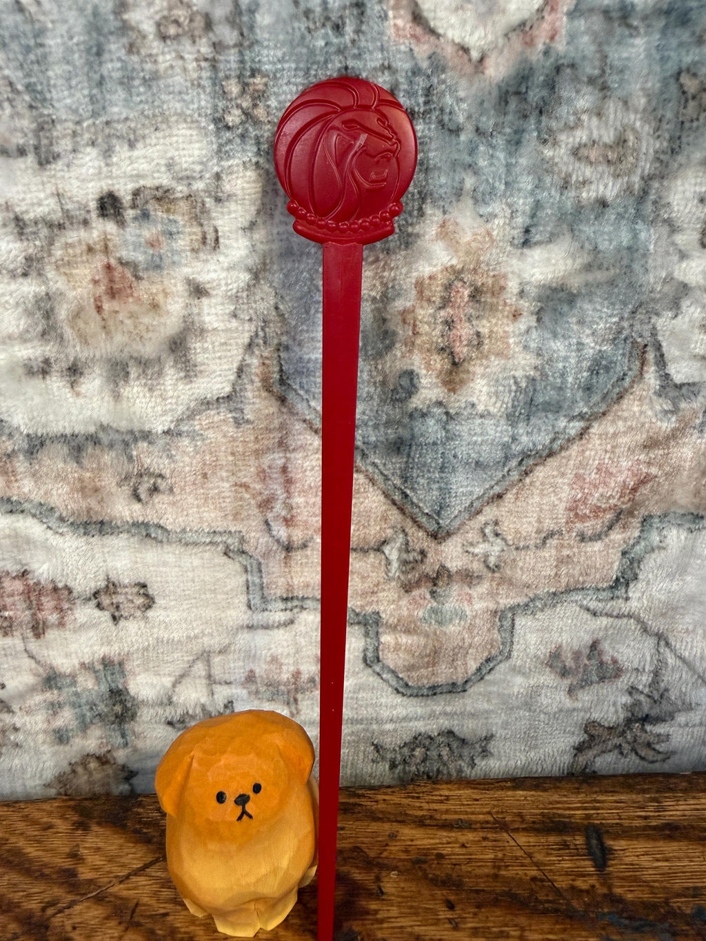 Vintage Red Plastic Swizzle Stick with Lion Head Design