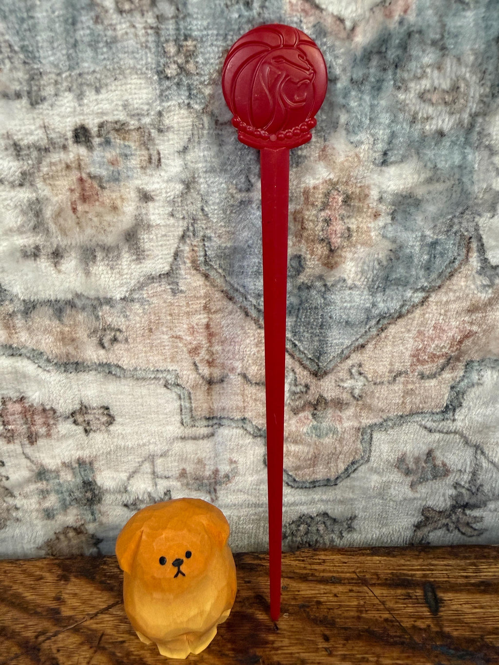 Vintage Red Plastic Swizzle Stick with Lion Head Design