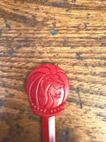 Vintage Red Plastic Swizzle Stick with Lion Head Design
