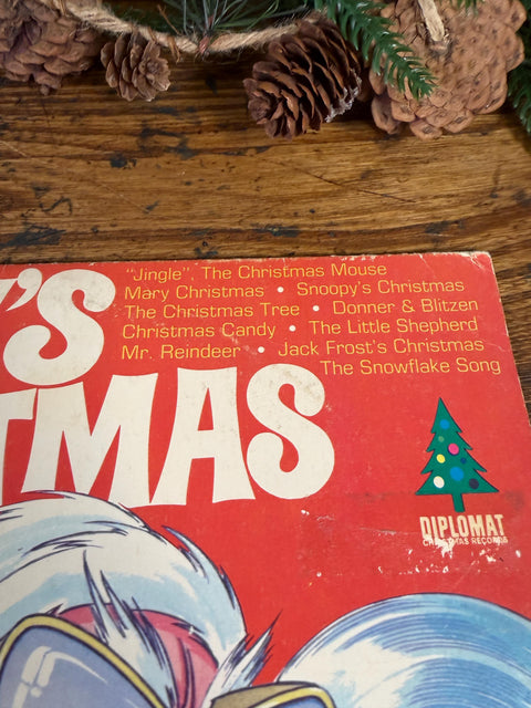 Snoopy's Christmas Vinyl Record by Diplomat - Festive Holiday Music