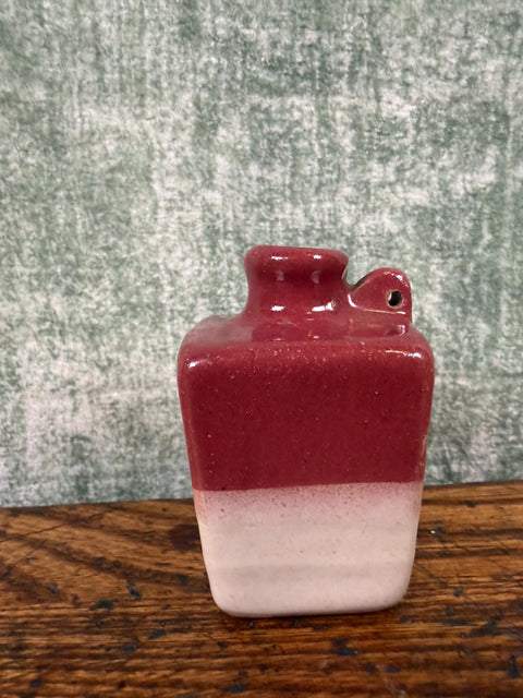 Small Two-Tone Ceramic Jug with Rich Red and Cream Glaze