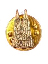 Collection of Vintage Travel Souvenir Pins from Various Locations
